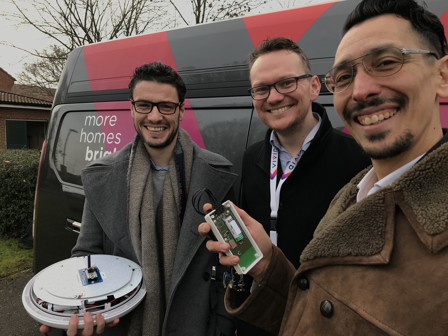 staff stood in front of VIVID van to do repairs